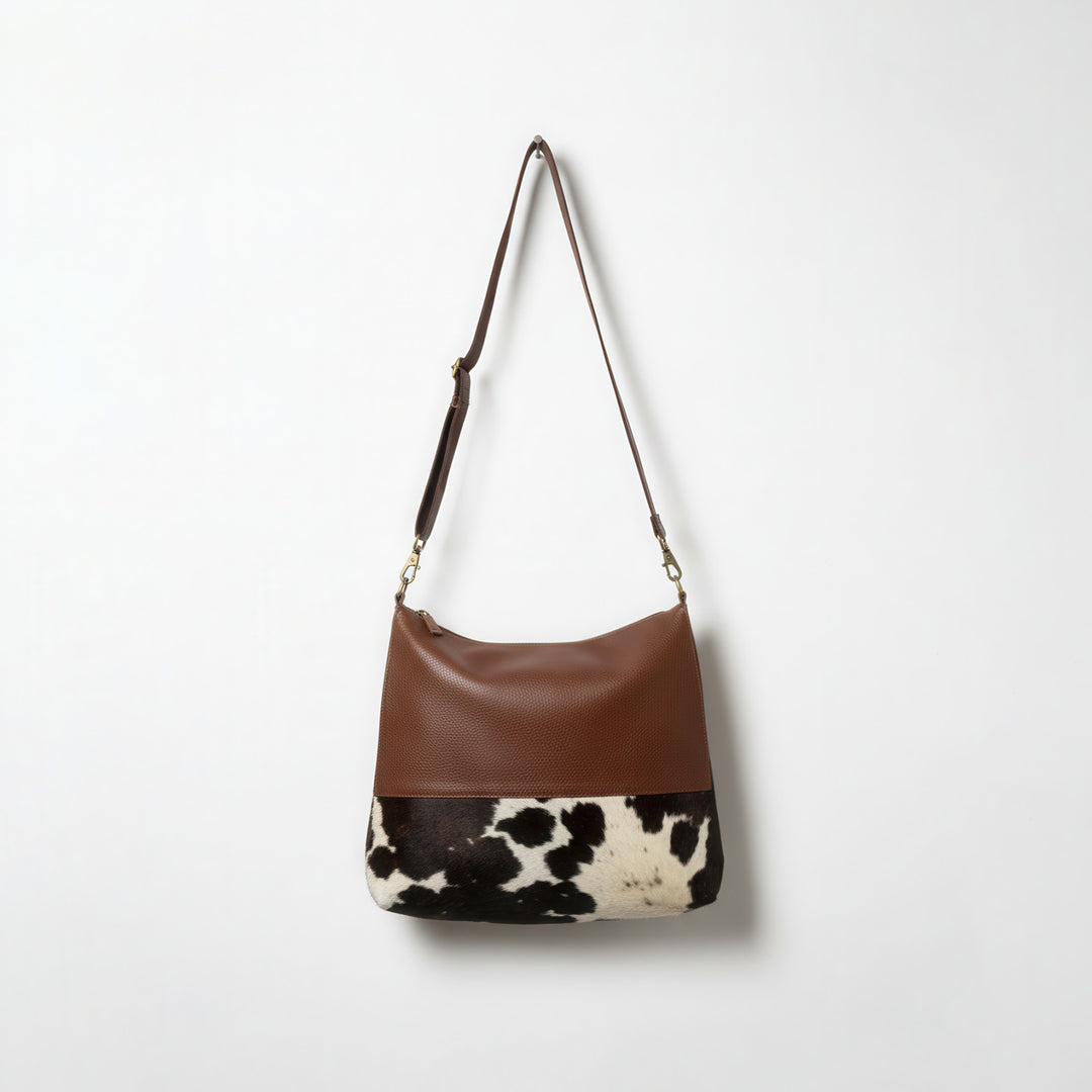 cowhide messenger bag natural