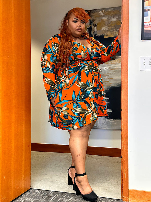 Plus Size orange with turquoise leaves  lighter weight wrap dress.