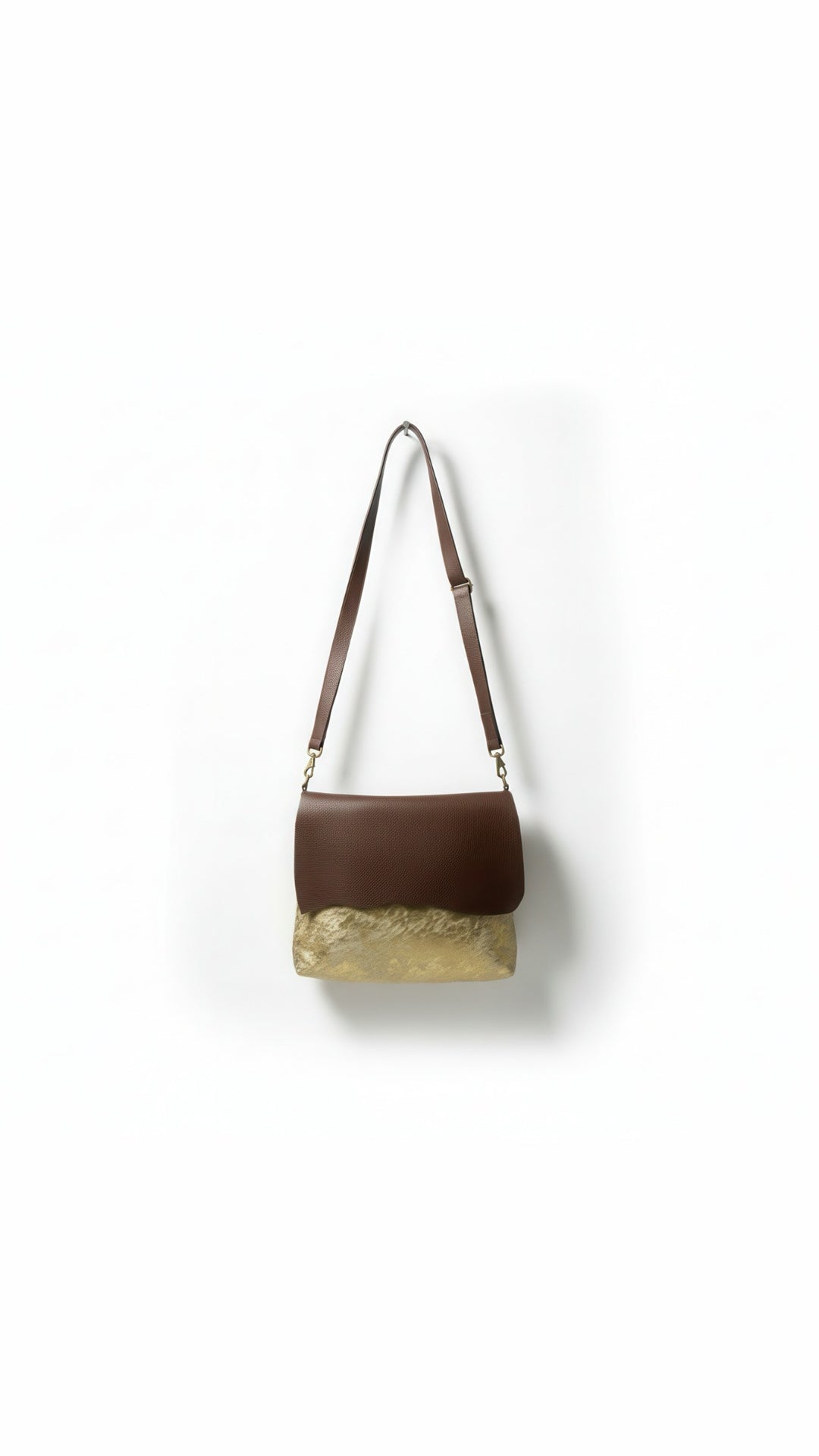 gold leather messenger bag