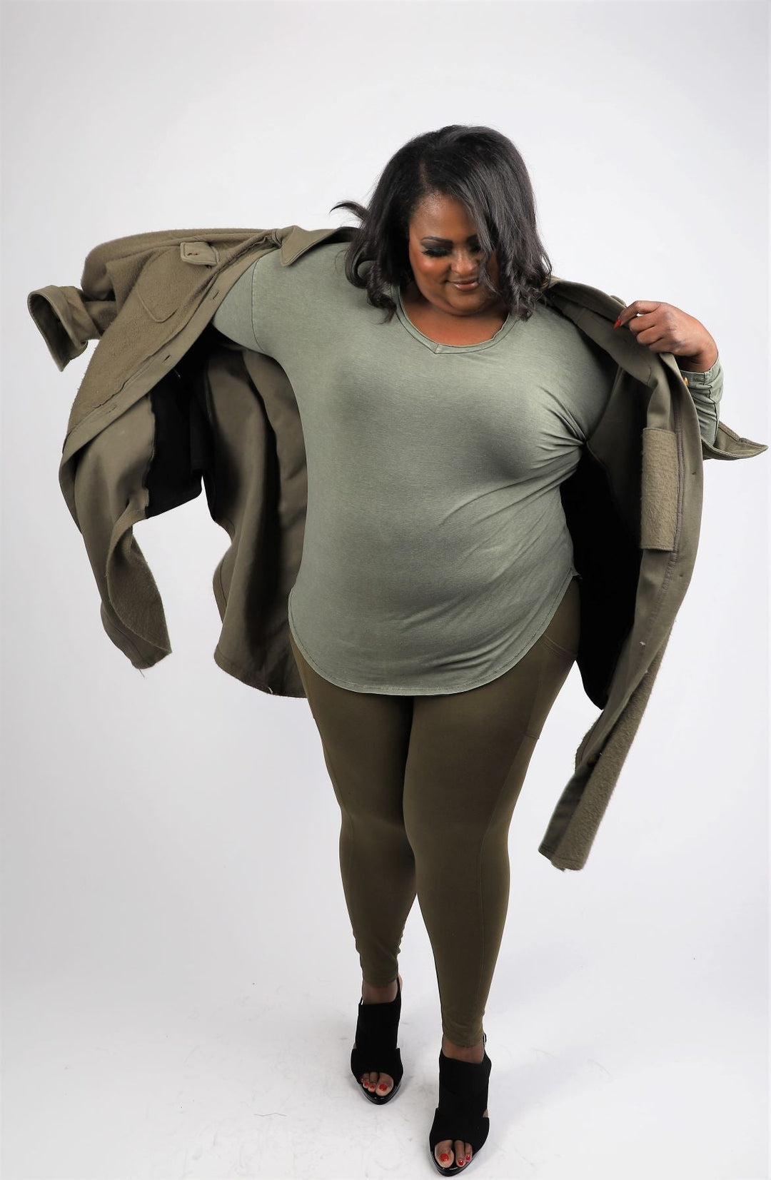 Plus size oversize olive shacket with mineral wash t shirt and olive cotton leggings
